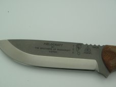 TOPS KNIVES Fieldcraft in 154cm stainless steel with tan canvas Micarta handle.