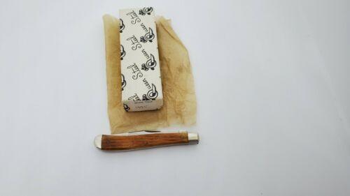 1995 Queen Honey Bone Slim Line Trapper NKCA Youth Year Knife 1 of 700 w/ case 1995 Queen Honey Bone Slim Line Trapper NKCA Youth Year Knife 1 of 700 w/ case