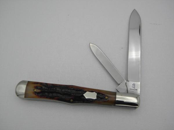 Queen Cutlery 5 3/8" slim coke bottle, carved amber stag bone handles: 2009,