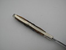 Queen Cutlery 5 3/8" slim coke bottle, carved amber stag bone handles: 2009,