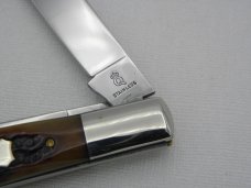 Queen Cutlery 5 3/8" slim coke bottle, carved amber stag bone handles: 2009,