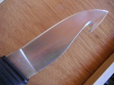 CRKT Wind River 2001 Fixed Blade Knife w/gut hook and leather sheath.  