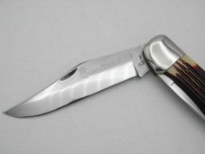 Queen Cutlery #39 Folding Hunter with “burnt orange” imitation Winterbottom bone