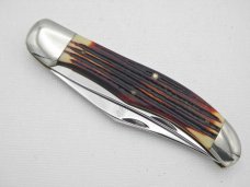 Queen Cutlery #39 Folding Hunter with “burnt orange” imitation Winterbottom bone