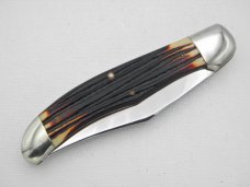 Queen Cutlery #39 Folding Hunter with “burnt orange” imitation Winterbottom bone