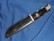 Jaguar fixed blade knife w/ sheath. Similar to a Buck 119.  Made in Japan???