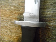 Jaguar fixed blade knife w/ sheath. Similar to a Buck 119.  Made in Japan???