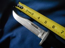 Jaguar fixed blade knife w/ sheath. Similar to a Buck 119.  Made in Japan???