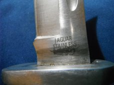 Jaguar fixed blade knife w/ sheath. Similar to a Buck 119.  Made in Japan???