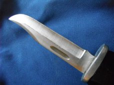 Jaguar fixed blade knife w/ sheath. Similar to a Buck 119.  Made in Japan???