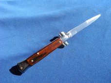 Italy Swivel Bolster Release  Bayonet Blade Italian Stiletto Switchblade Knife.  THAT'S ITALIAN!!!