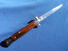 Italy Swivel Bolster Release  Bayonet Blade Italian Stiletto Switchblade Knife.  THAT'S ITALIAN!!!