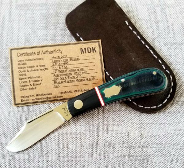 Michael du Pleesis Lanny Clip Knife,3.5" Teal Linen Micarta, black g10 and N690,coa slip new Michael du Pleesis Lanny Clip Knife,3.5" Teal Linen Micarta, black g10 and N690,coa slip new