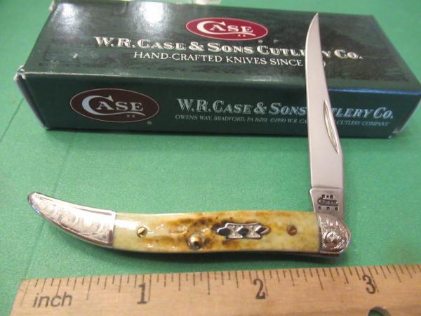 Case XX 2004 Scrolled Bolsters Amber Bone XX Shield Tiny Texas Toothpick Pattern # 610096 SS Case XX 2004 Scrolled Bolsters Amber Bone XX Shield Tiny Texas Toothpick Pattern # 610096 SS