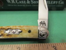 Case XX 2004 Scrolled Bolsters Amber Bone  XX Shield Tiny Texas Toothpick Pattern # 610096 SS