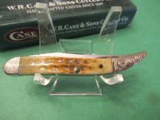 Case XX 2004 Scrolled Bolsters Amber Bone  XX Shield Tiny Texas Toothpick Pattern # 610096 SS