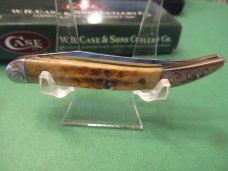 Case XX 2004 Scrolled Bolsters Amber Bone  XX Shield Tiny Texas Toothpick Pattern # 610096 SS