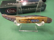 Case XX 2004 Scrolled Bolsters Amber Bone  XX Shield Tiny Texas Toothpick Pattern # 610096 SS
