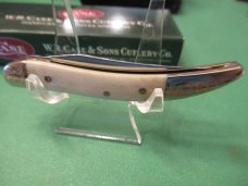 Case XX 2005 Scrolled Bolsters Serial # 054 White Bone Tiny Texas Toothpick Pattern # 610096 SS 