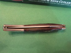 Case XX 2004 Brown Bone Scrolled Bolsters Tiny Texas Toothpick Pattern # 610096 SS