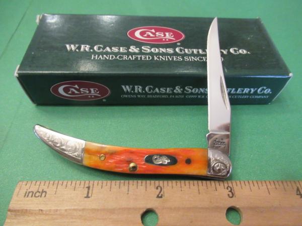 Case XX 2005 Orange Bone Scrolled Bolsters Tiny Texas Toothpick Pattern # 610096 SS