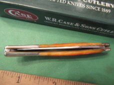 Case XX 2005 Orange Bone Scrolled Bolsters Tiny Texas Toothpick Pattern # 610096 SS