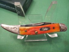 Case XX 2005 Orange Bone Scrolled Bolsters Tiny Texas Toothpick Pattern # 610096 SS