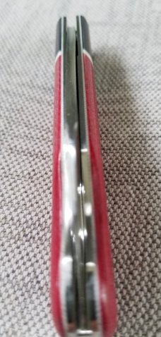MDK custom Barlow, easy open Wharnie, 3.8 closed, red micarta and black G-10..coa..slip..N690 
