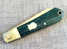 MDK custom Native, Teal  micarta scales.giaraffe bolsters and SHIELDS, lanyard 3.75