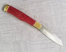 K'roo Custom Native 4" Burgundy micarta scales and brass..spacers .. bolsters and caps ...filework