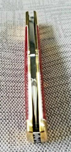 K'roo Custom Native 4" Burgundy micarta scales and brass..spacers .. bolsters and caps ...filework