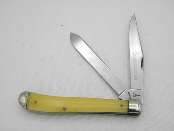 Queen Cutlery #30  Amber Handled Slim Trapper:  4 1/8” closed, 1958 - 1960, etched blade, Q STEEL ta