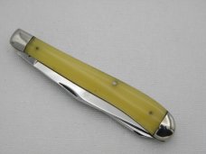 Queen Cutlery #30  Amber Handled Slim Trapper:  4 1/8” closed, 1958 - 1960, etched blade, Q STEEL ta