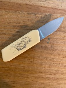 Gerber touché belt buckle knife wood grain and scrimshaw fish