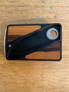 Gerber touché belt buckle knife wood grain and scrimshaw fish