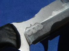 Custom handmade fixed blade knife with leather sheath.  A very sharp edge.