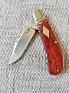 K'roo Custom Lanny clip,3.75" Kudu Bone scaless..dyed & resin impregnate..fluted bolsters ..filework