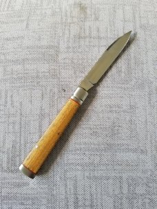 K'roo Custom Doctor knife. 4" Sneezewood scaless..liners & spacers..fluted bolsters ..filework