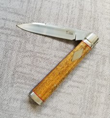K'roo Custom Doctor knife. 4" Sneezewood scaless..liners & spacers..fluted bolsters ..filework