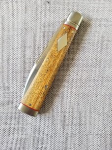 K'roo Custom Doctor knife. 4" Sneezewood scaless..liners & spacers..fluted bolsters ..filework
