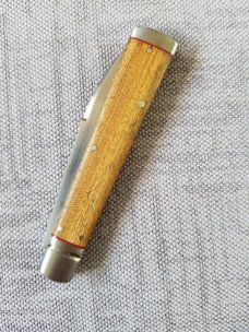 K'roo Custom Doctor knife. 4" Sneezewood scaless..liners & spacers..fluted bolsters ..filework
