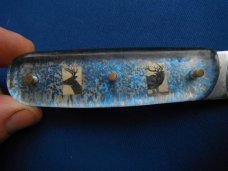Custom handmade fixed blade skinning knife, camp knife with leather sheath.  A sharp edge.