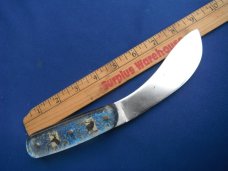 Custom handmade fixed blade skinning knife, camp knife with leather sheath.  A sharp edge.