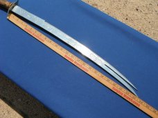 Arab two prong tip Sword with original sheath.  Made in Iraq. Very sharp!!! 23.5" Blade 33.5 OAL.  