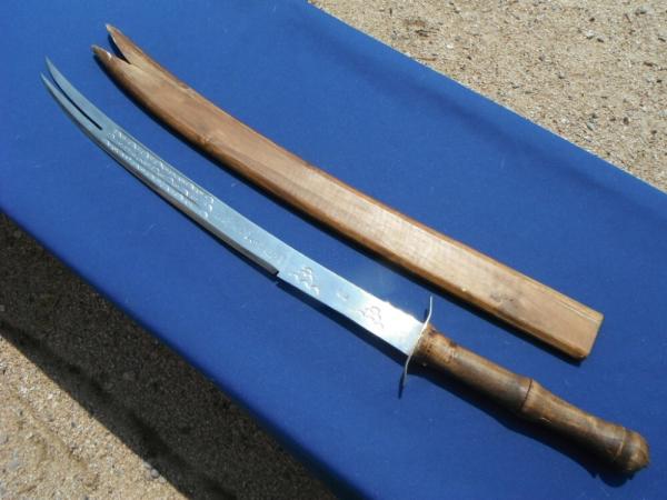 Arab two prong tip Sword with original sheath.  Made in Iraq. Very sharp!!! 23.5" Blade 33.5 OAL.  