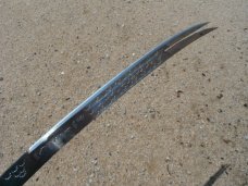Arab two prong tip Sword with original sheath.  Made in Iraq. Very sharp!!! 23.5" Blade 33.5 OAL.  