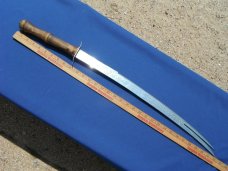 Arab two prong tip Sword with original sheath.  Made in Iraq. Very sharp!!! 23.5" Blade 33.5 OAL.  
