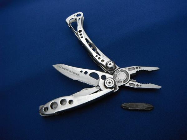 LEATHERMAN Skeletool Stainless Steel Multi-Tool, Pliers, Folding Knife, Phillips Half Serrated Blade