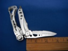LEATHERMAN Skeletool Stainless Steel Multi-Tool, Pliers, Folding Knife, Phillips Half Serrated Blade