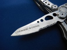 LEATHERMAN Skeletool Stainless Steel Multi-Tool, Pliers, Folding Knife, Phillips Half Serrated Blade